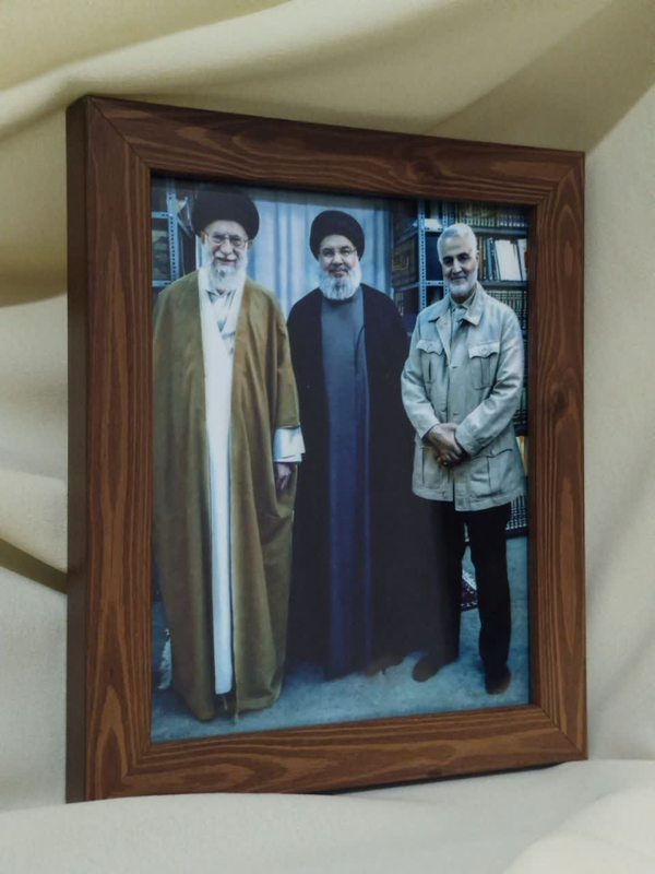 قاب عکس رهبری، سید حسن نصرالله و سردار سلیمانی