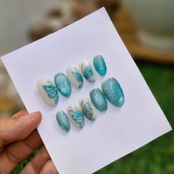 ناخن مصنوعی با مواد کاشت طرح پروانه آیس (به همراه پک اختصاصی)