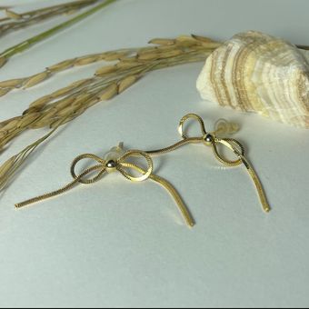 گوشواره طلایی طرح روبان