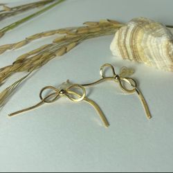 گوشواره طلایی طرح روبان