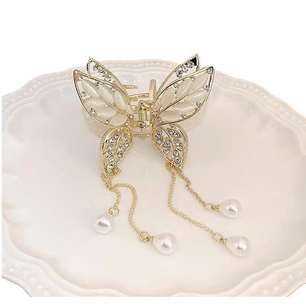 کلیپس پروانهای فلزی مجلسی با نگینهای کریستالی