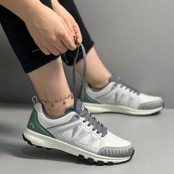 کتونی زنانه برند کریویت آلمان رنگ طوسی پشت سبز