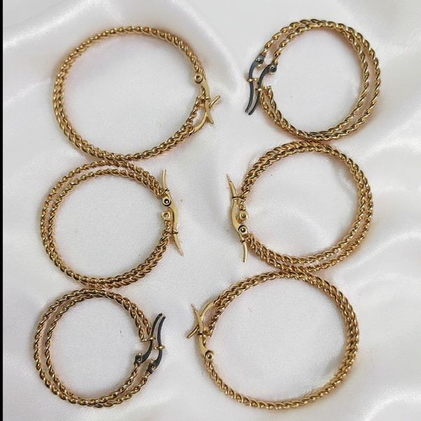 گوشواره استیل حلقه ای پیچی طلایی