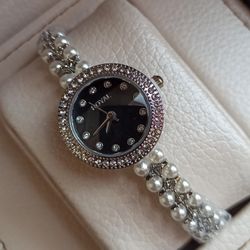 ساعت مچی زنانه مرواریدی رویال سیلور صفحه مشکی رنگ ثابت