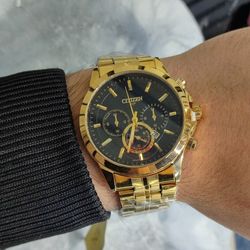 ساعت مچی عقربه ای مردانه سیتیزن طلایی بنداستیل رنگ ثابت مدل 36492