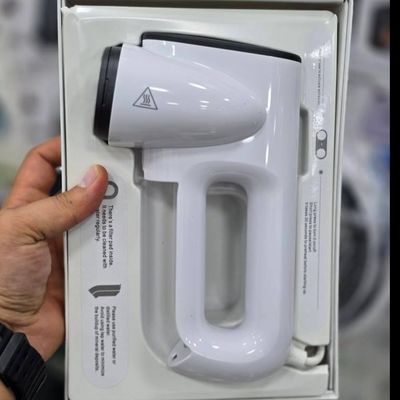 دستگاه اتو بخار مکشی (Aspirating Steamer / Suction-Type Ironing Machine