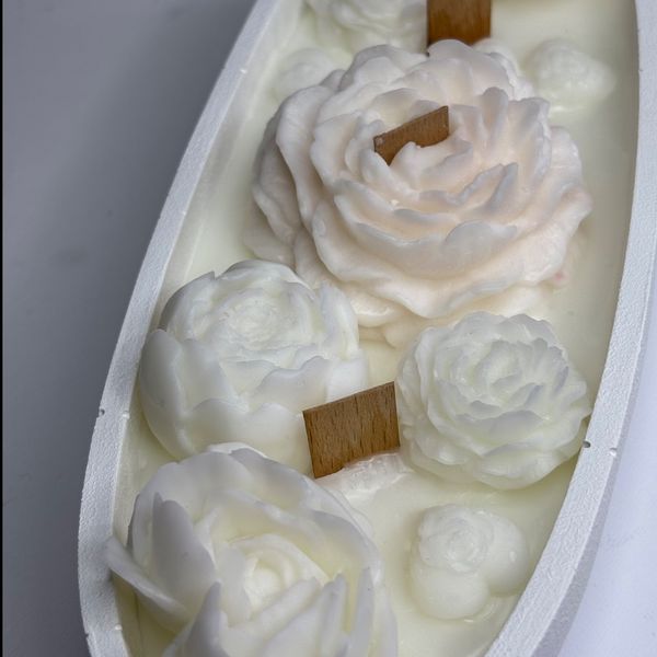 شمع قایقی گل‌دار – ترکیب هنر سنگ و موم