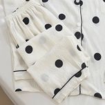 ست دو تکه بلوز و شلوار موسلین طرح خال خالی مشکی زمینه سفید فری سایز 38 تا 48