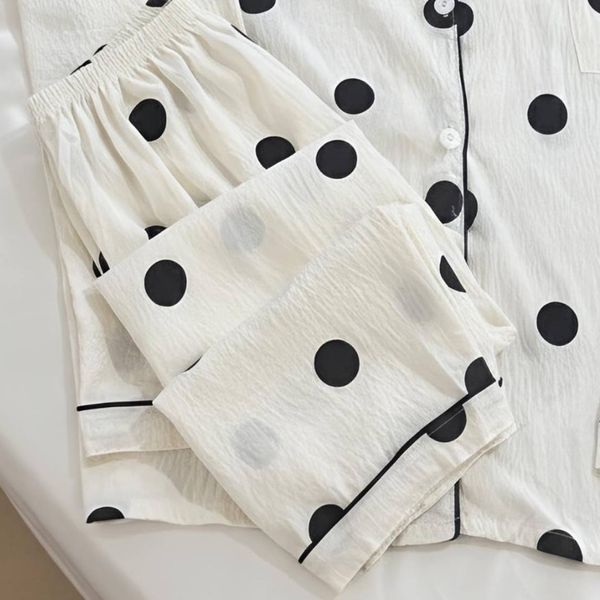 ست دو تکه بلوز و شلوار موسلین طرح خال خالی مشکی زمینه سفید فری سایز 38 تا 48