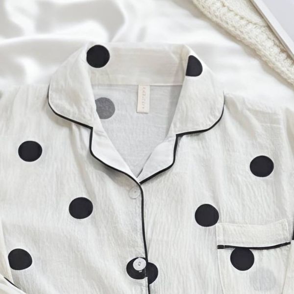 ست دو تکه بلوز و شلوار موسلین طرح خال خالی مشکی زمینه سفید فری سایز 38 تا 48