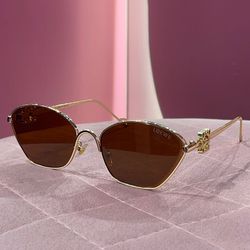 عینک loewe طلایی شیشه قهوه ای