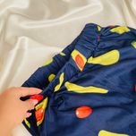 ست تیشرت قرمز طرح آووکادو و شلوار سرمه‌ای پاگانی (سایز پلاس 40 تا 50) | فروشگاه شین دخت