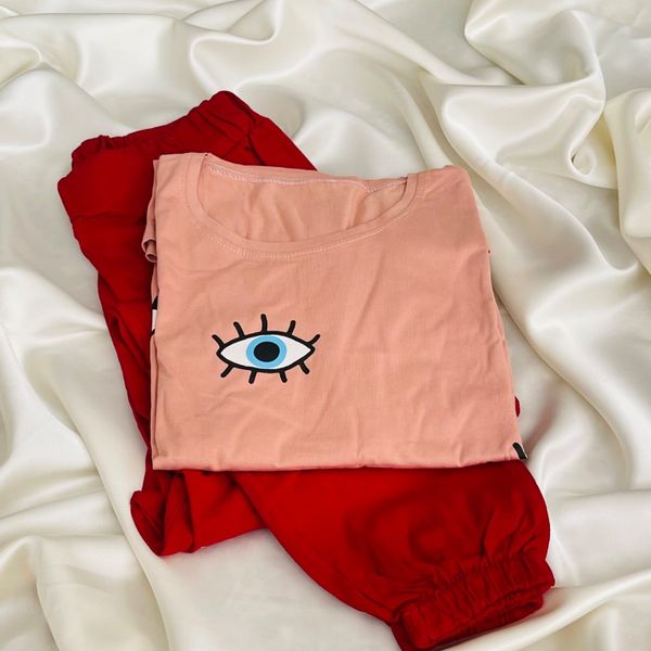 ست تیشرت طرح تک‌چشم و شلوار قرمز جاگر برند پاگانی (مناسب سایز 38 تا 42)