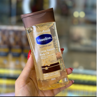 روغن بدن وازلین مدل cocoa radiant (قهوه وکاکائو)