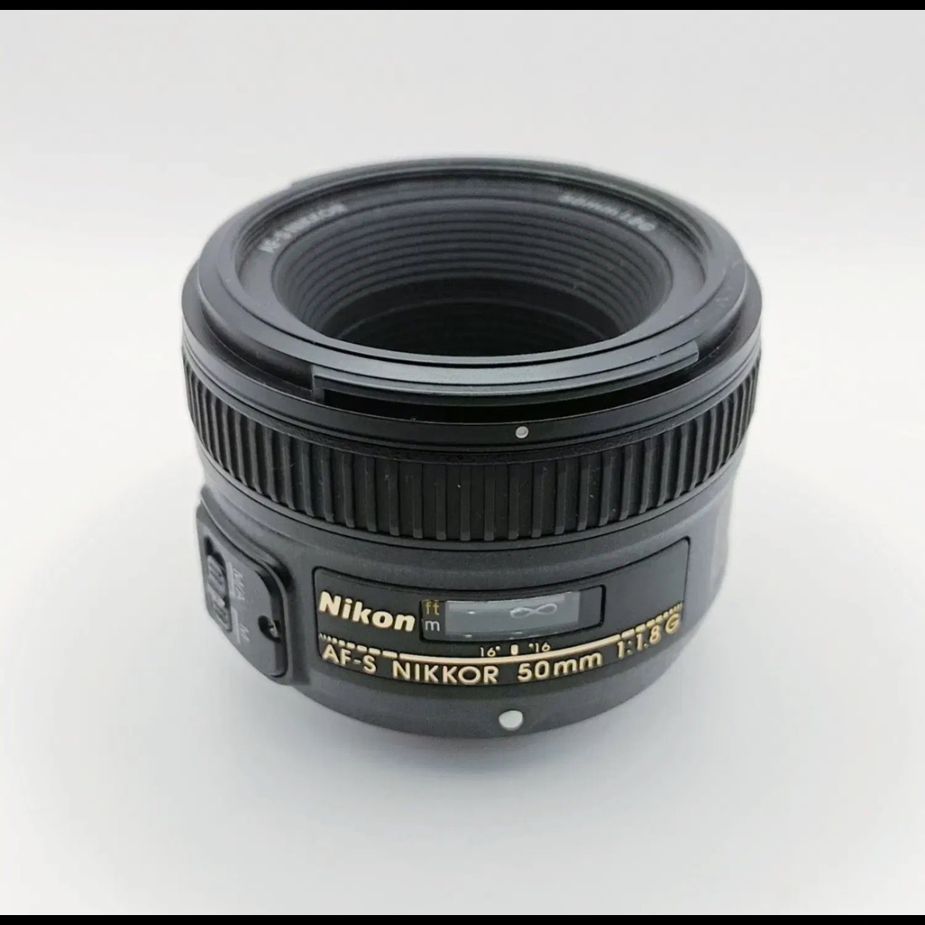 لنز نیکون 50 میلیمتر فیکس f 1.8 کارکرده