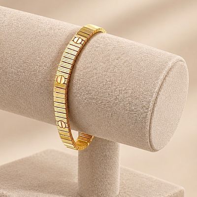 دستبند استیل کارتیر unlimited طلایی