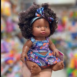 عروسک نشسته فرفری