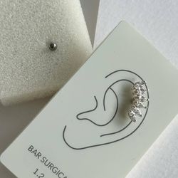 پیرسینگ گوش نگین زیرکنیا