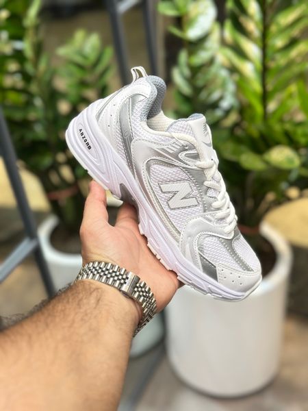 کفش زنانه نیوبالانس530سفید نقره ایی