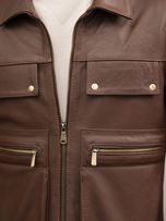 کاپشن چرم طبیعی چهار زیپ قهوه ای j194