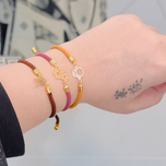 دستبند طلا با نخ ابریشمی طرح دسته گل