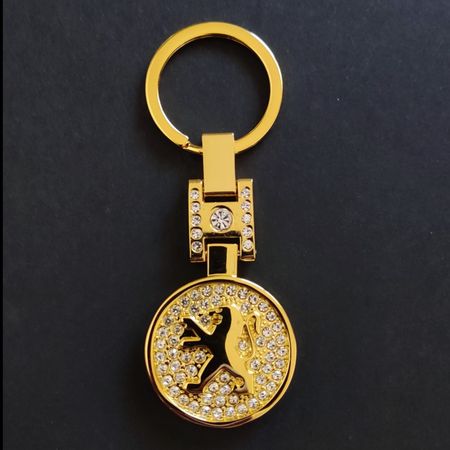 جاسوییچی نگین دار طرح پژو _ اورجینال طلایی