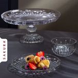 سرویس پذیرایی کریستال 25 پارچه ساکورا مدل پیانو شامل میوهخوری، شیرینیخوری، آجیلخوری پایهدار، فنجان و پیشدستی، قابل شستوشو