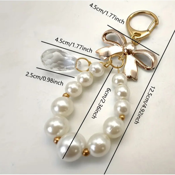 جاکلیدی پاپیونی مرواریدی ظریف با آویز کریستالی