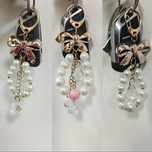 جاکلیدی پاپیونی مرواریدی ظریف با آویز کریستالی