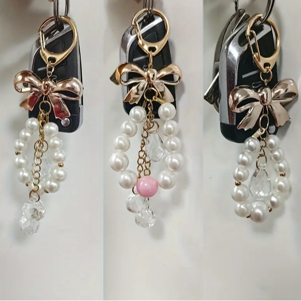 جاکلیدی پاپیونی مرواریدی ظریف با آویز کریستالی