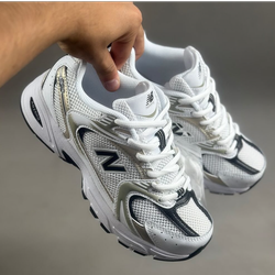 کتونی نیوبالانس 530 رنگ سفید طلایی