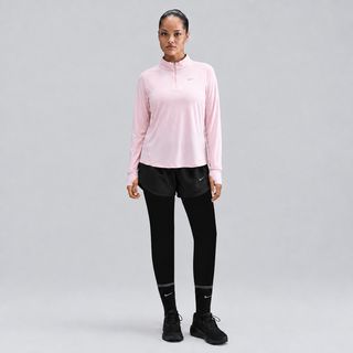 شلوارک لگ دار ورزشی زنانه نایکی مدل Dri-FIT کد HM 6098-011