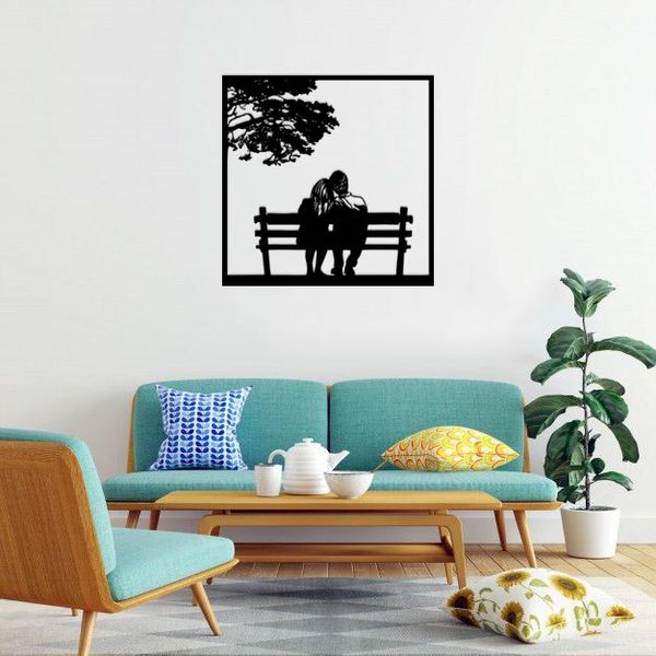 دیوارکوب ماهوت طرح قاب زوج روی صندلی