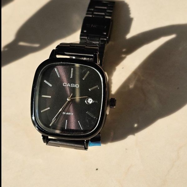 ست ساعت مچی زنانه و مردانه کاسیو (Casio) مدل چهارگوش؛ بند استیل تمام مشکی با نمایشگر تقویم