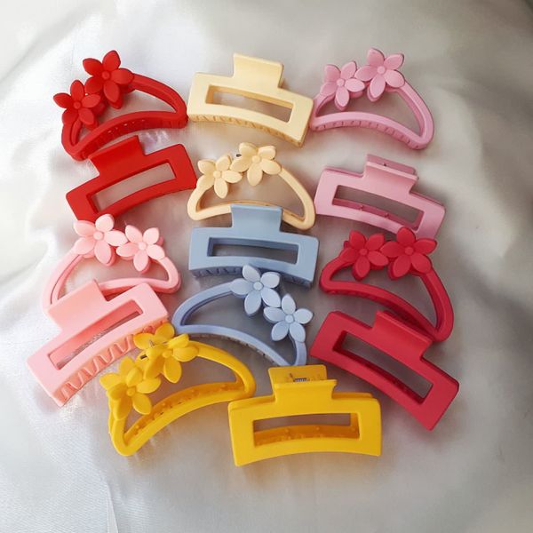 کلیپس مو زنانه مدل شمعی مات صندوقی و گلدار بسته 2 عددی