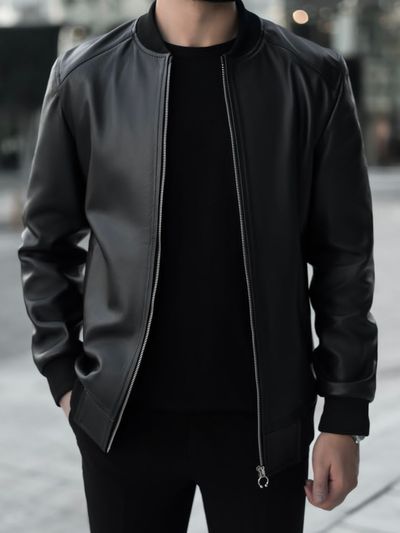 کاپـشن چرم طبیعی مشکی j151