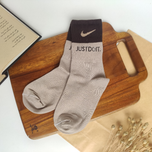 جوراب ساقدار کش انگلیسی یونیسکس طرح Just Do It Nike برند دومینو