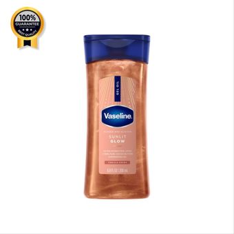 ژل روغن شاین براق کننده بدن وازلین رنگ هلویی مدل Sunlit Glow Vanilla Cocoa