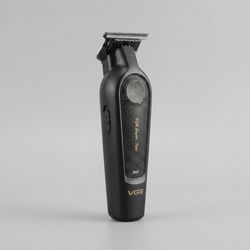 ماشین اصلاح موی سر و صورت وی جی آر مدل V-995 با تیغه کربن استیل، باتری لیتیوم یون 2000 میلی‌آمپر ساعت، شارژ USB، قابلیت تنظیم سر