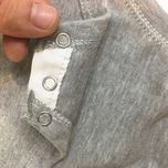 بادی بدون آستین نوزادی آرم پوش مدل یقه باز شونده