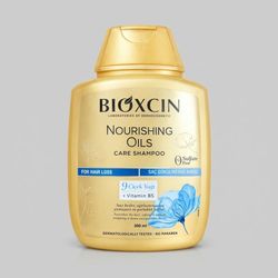شامپو تقویت‌کننده و ترمیم‌کننده مو بیوکسین مدل Nourishing Oils Care حجم 300 میلی‌لیتر، مناسب انواع مو، فاقد سولفات و پارابن، حاو