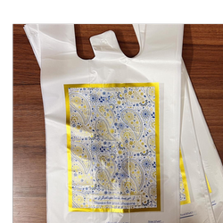 نایلون بسته بندی دسته دار طرح انگشت باف یک کیلویی