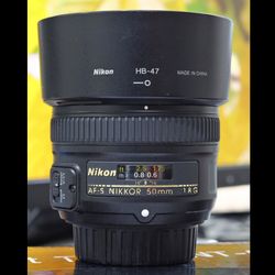 لنز Nikon AF-S 50mm f/1.8G در حد آک (کارکرده)