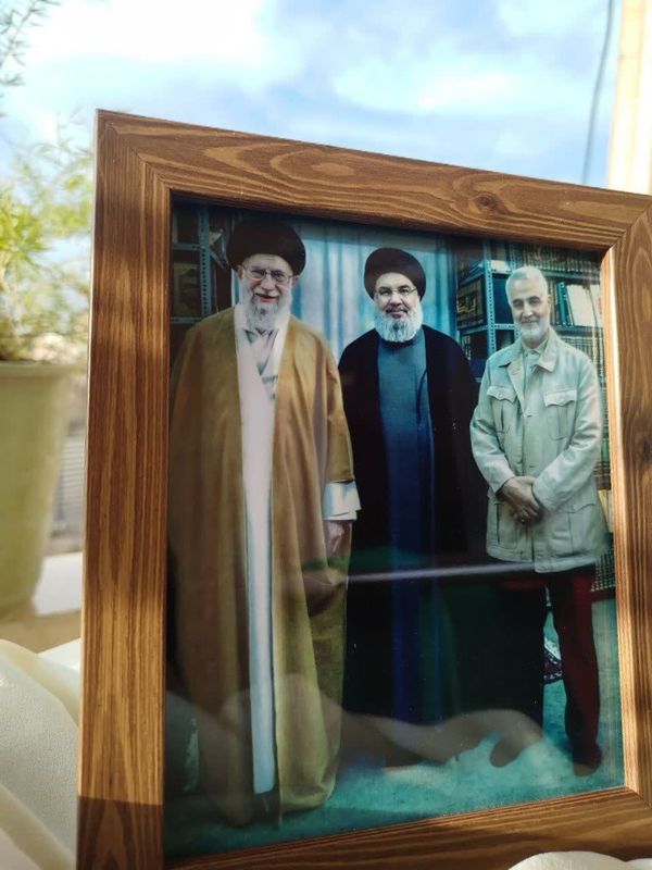 قاب عکس رهبری، سید حسن نصرالله و سردار سلیمانی