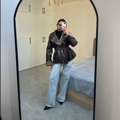 کت چرم قهوه ای داخل تدی