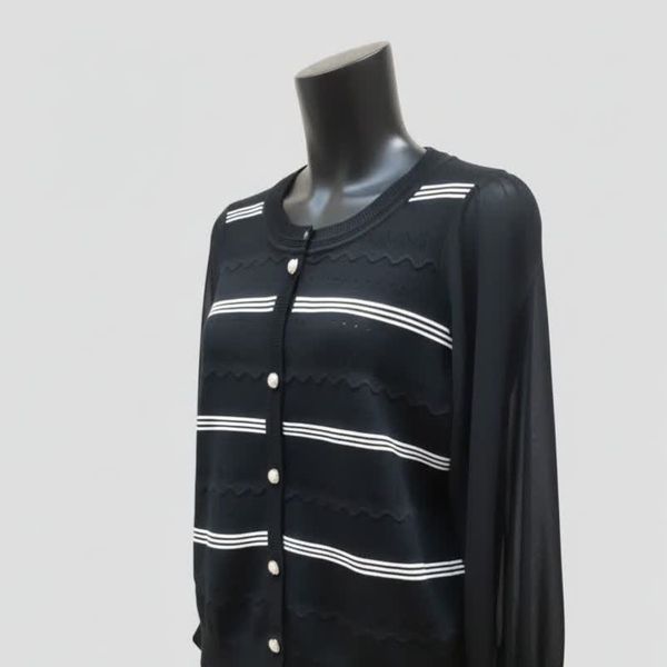 بلوز طرح بافت ریز و استین پارچه ای