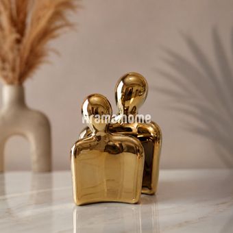 مجسمه زوج سرامیکی طلایی