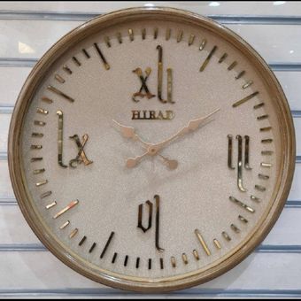 ساعت دیواری طلایی اعداد لاتین