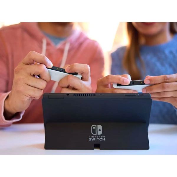 کنسول بازی هیبریدی نینتندو مدل Switch - OLED Neon Blue and Neon Red ظرفیت 64 گیگابایت