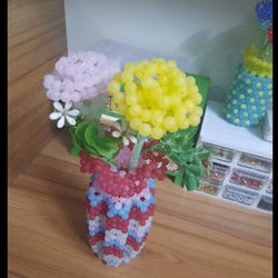 گلدان بادوشاخه گل مصنوعی(پس کرایه)